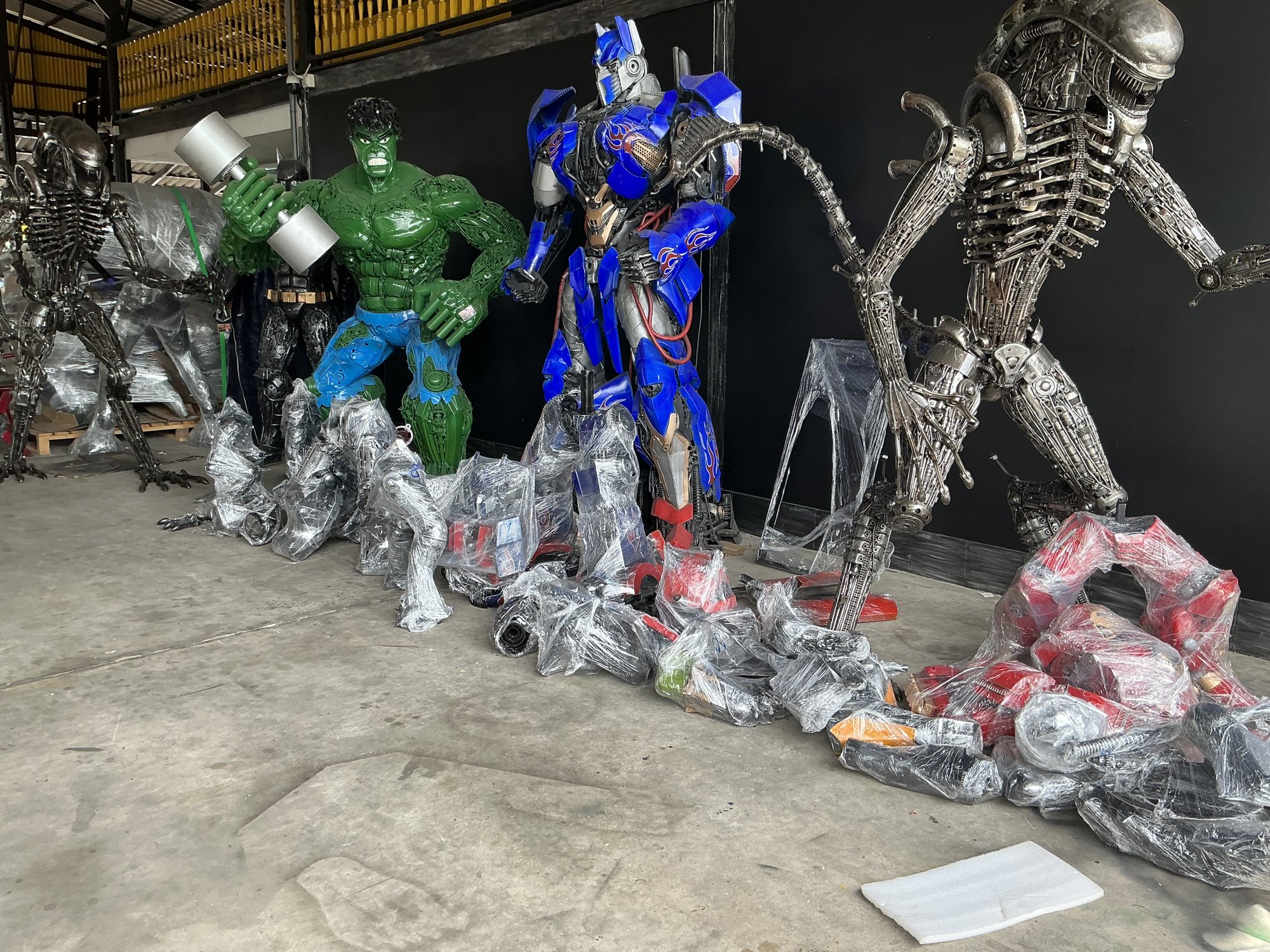 Wrapped parts laid out on the floor of the yard
