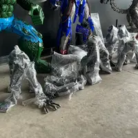 Arms, legs and a clawed hand, each wrapped on its own